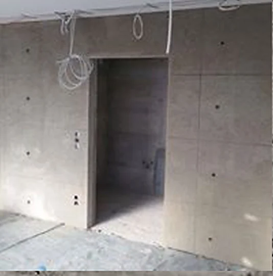 Sichtbetonwand als fertig gestelltes Gestaltungselement in industrieller Anmutung